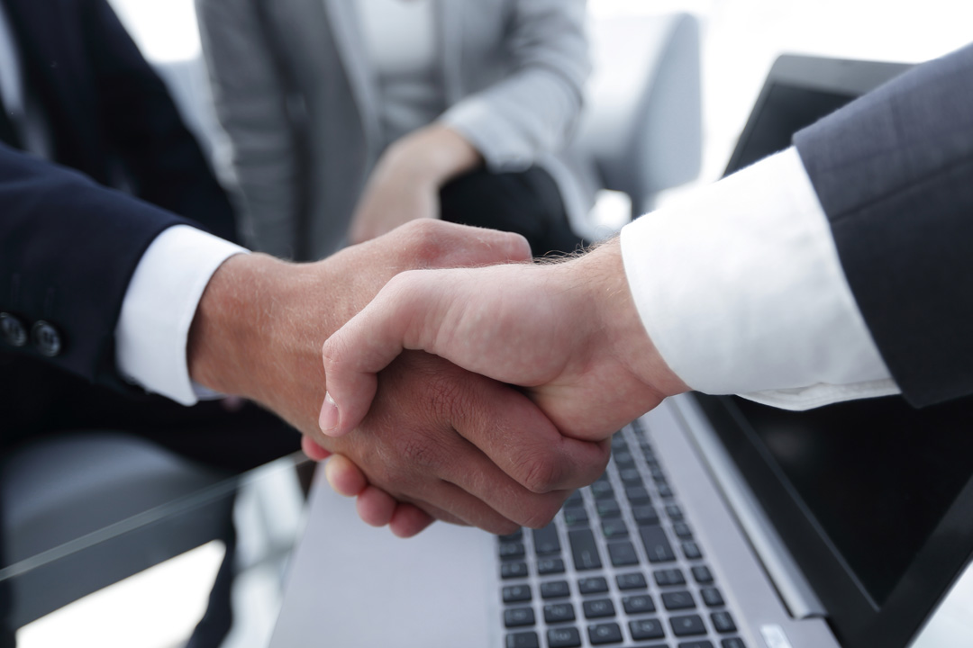 Two Confidence Businessman Shaking Hands Close-up View Of Hands,